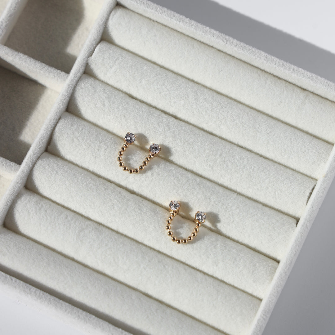 Double Piercing Diamond Studs