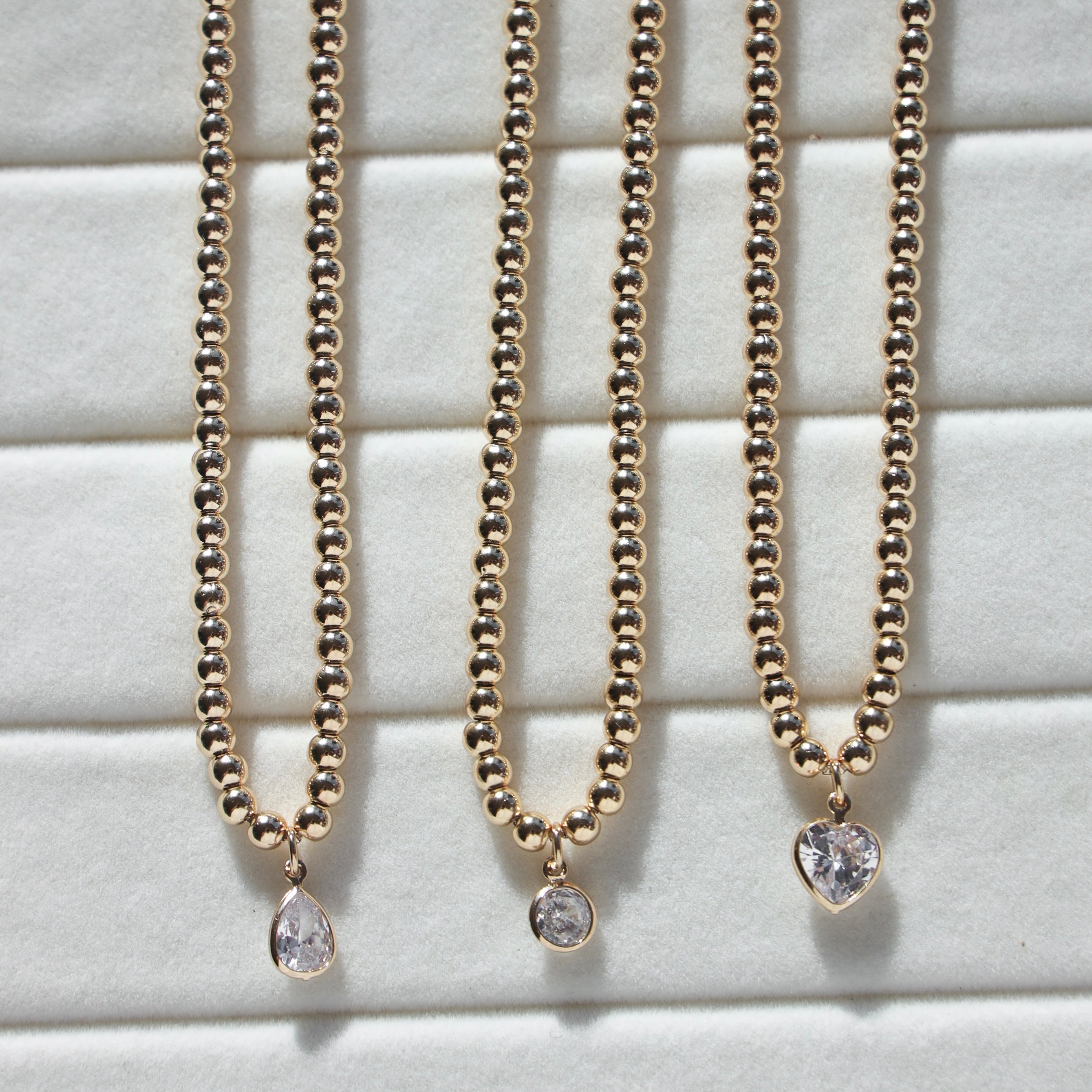 CRYSTAL CIRCLE BEADED NECKLACE