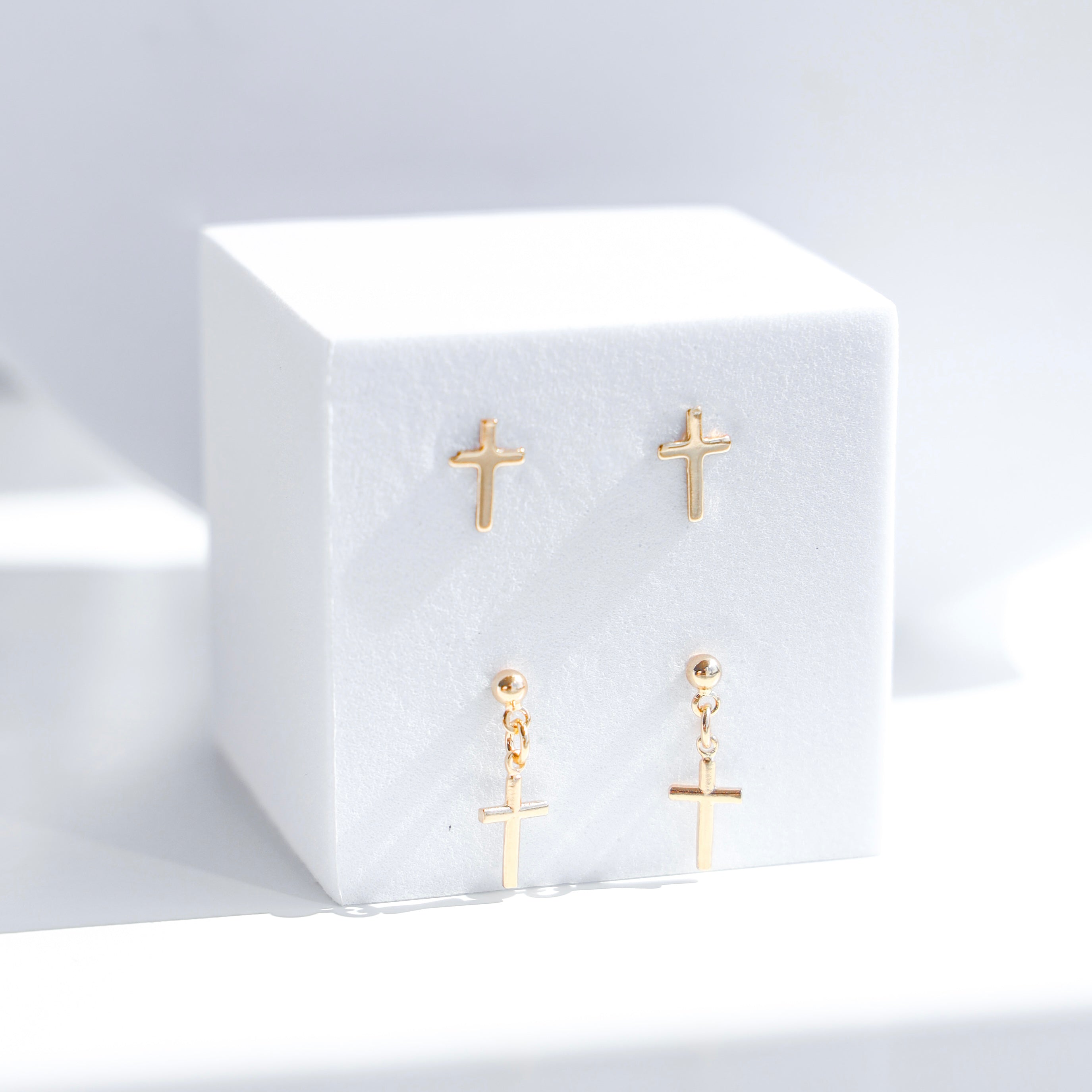 CROSS CHARM STUDS