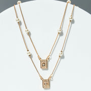 DOUBLE PEARL HAMSA NECKLACE